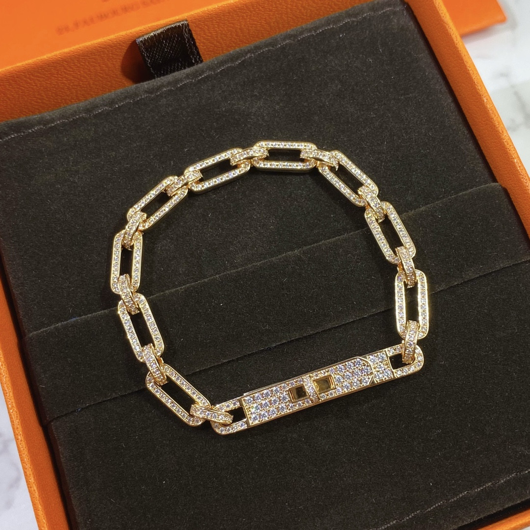 hermès fully Di*m*nd-encrusted kelly bracelet