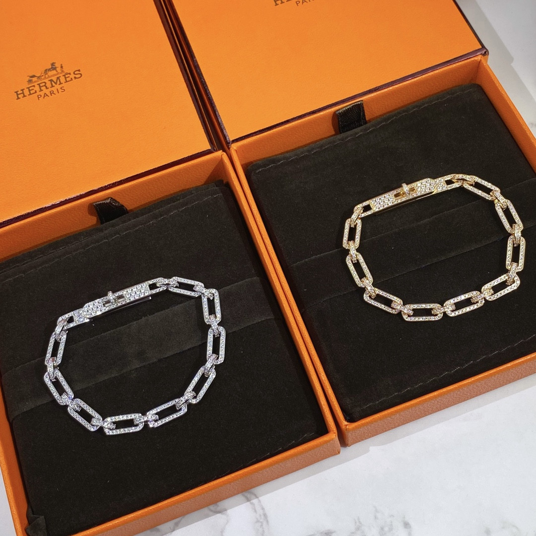 hermès fully Di*m*nd-encrusted kelly bracelet