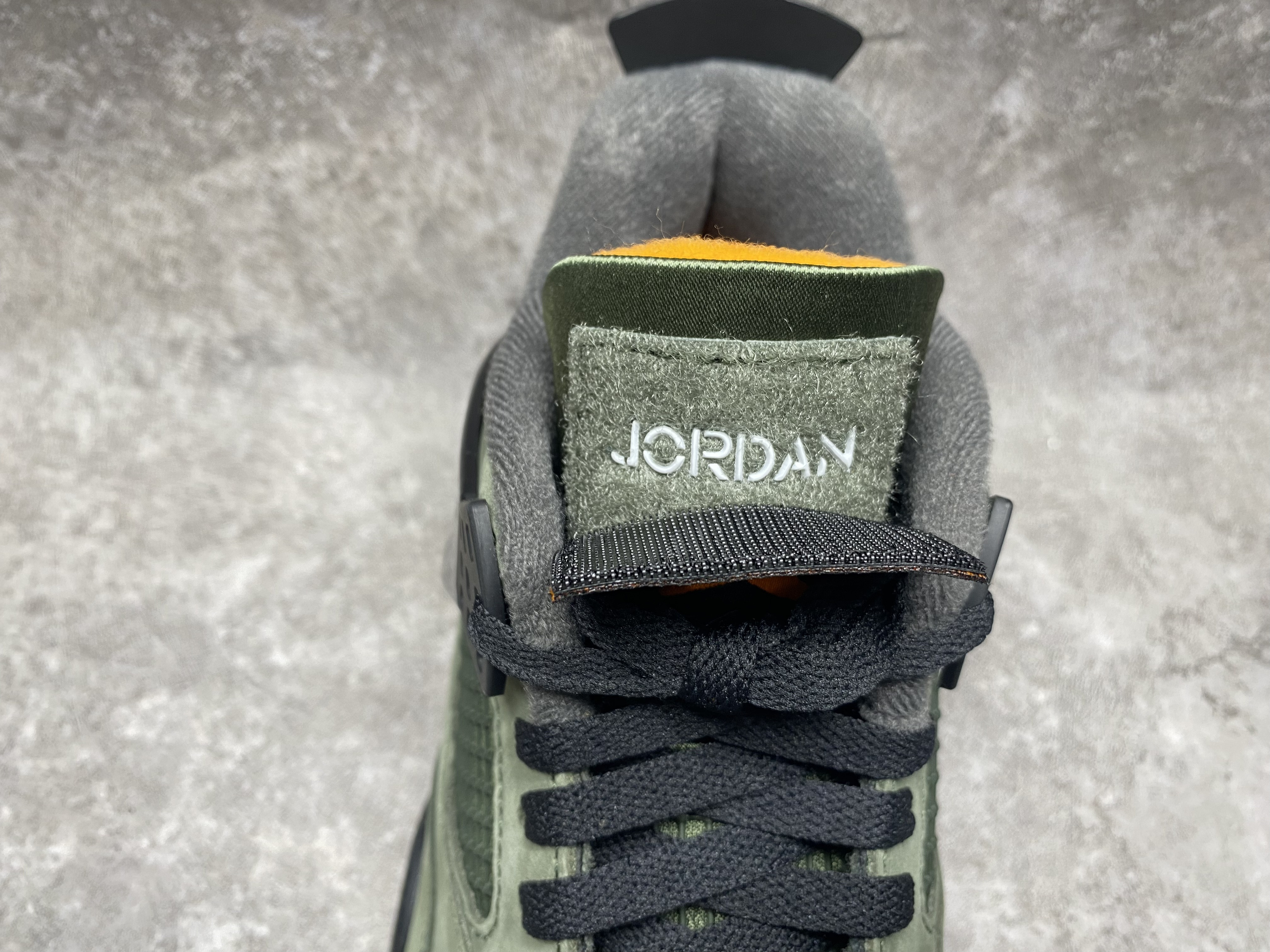 UA Jordan 4 Retro