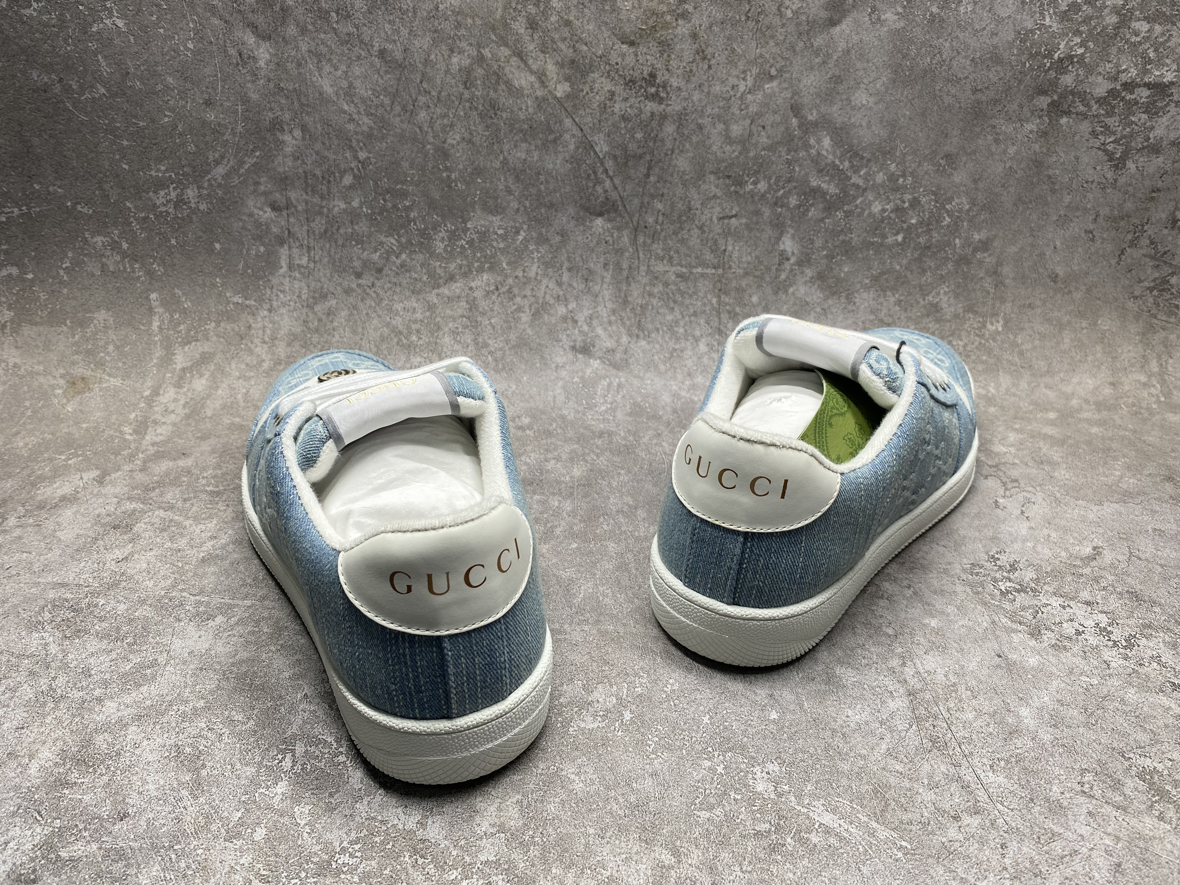 ua G*u*i sneakers