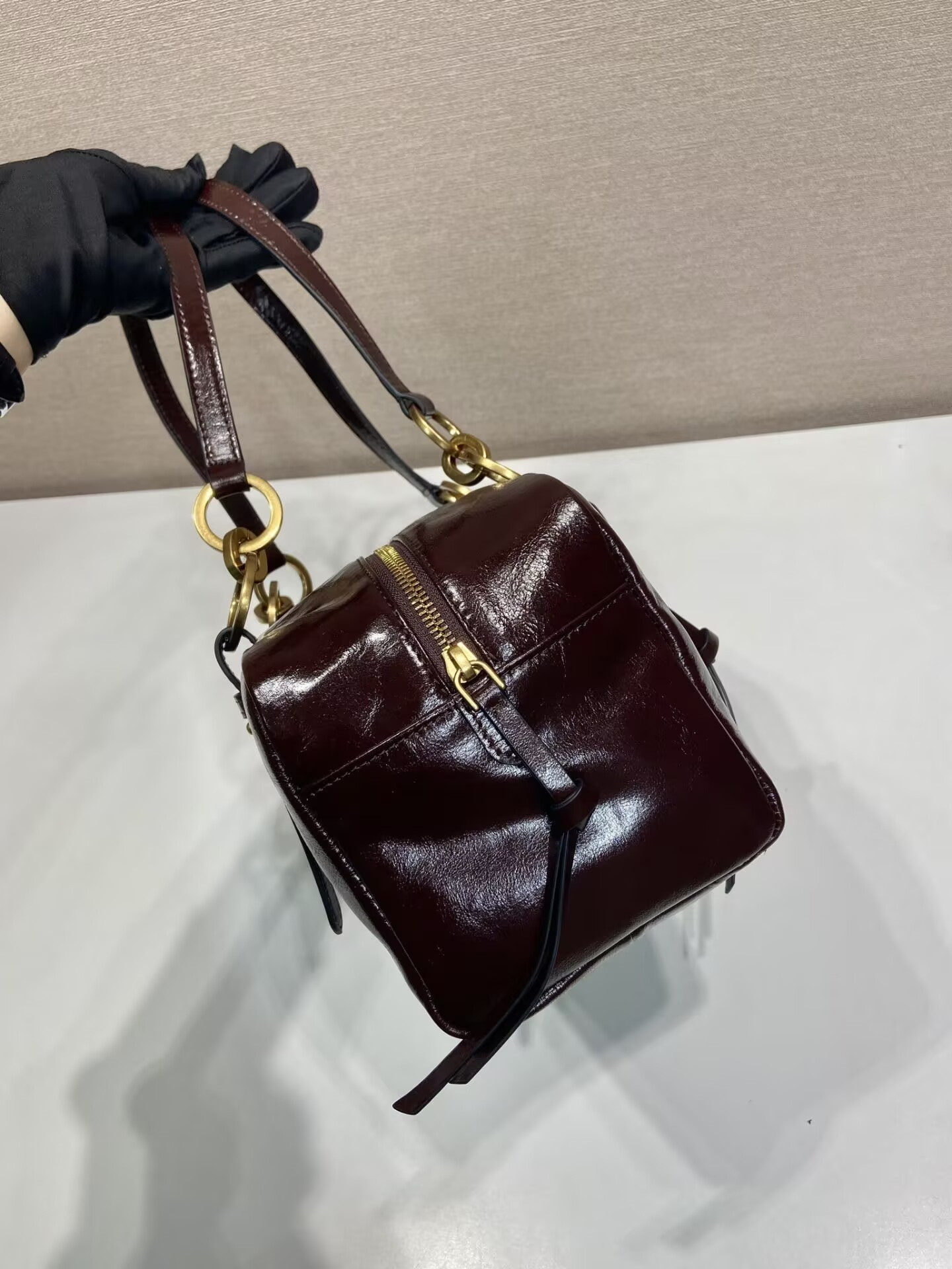 Pra*a dangle medium leather top-handle bag 14x30x13.5cm