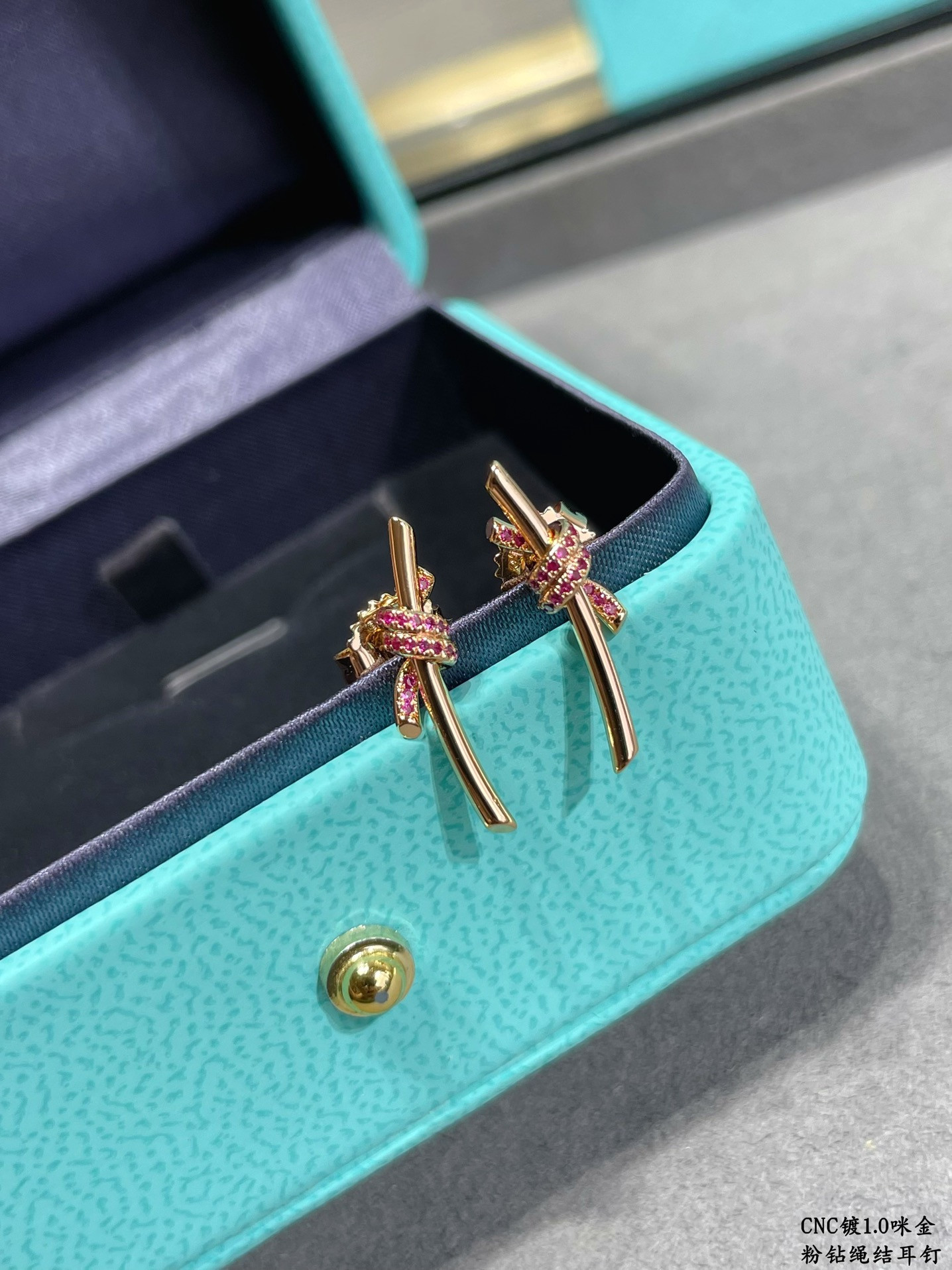 t*f*ny & co. pink Di*m*nd t wire knot stud earrings