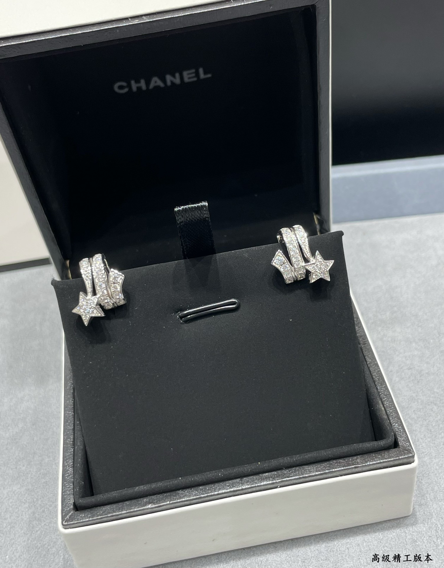 Ch*el comet earrings