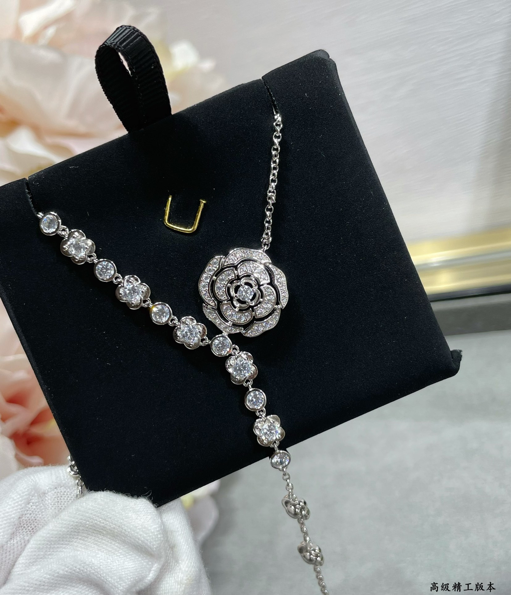Ch*el camellia water drop tassel necklace
