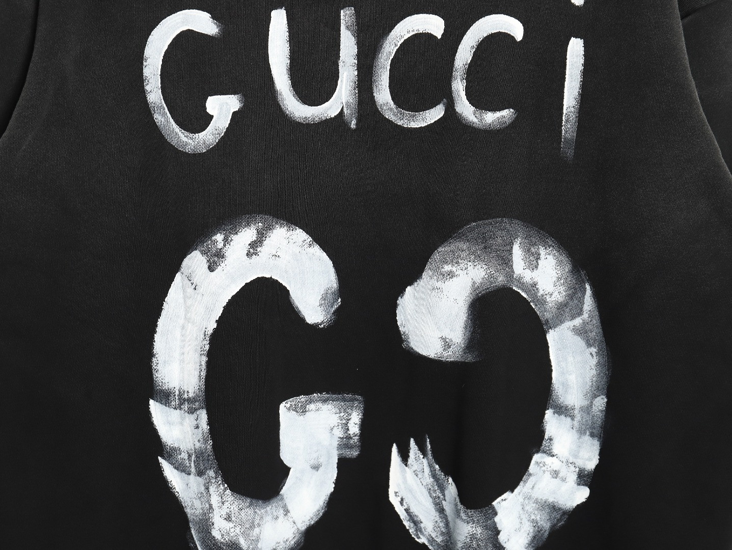 G*u*i hoodies