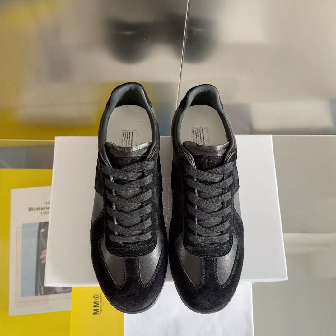 ua ma*s*n Ma*i*la mm6 sneakers