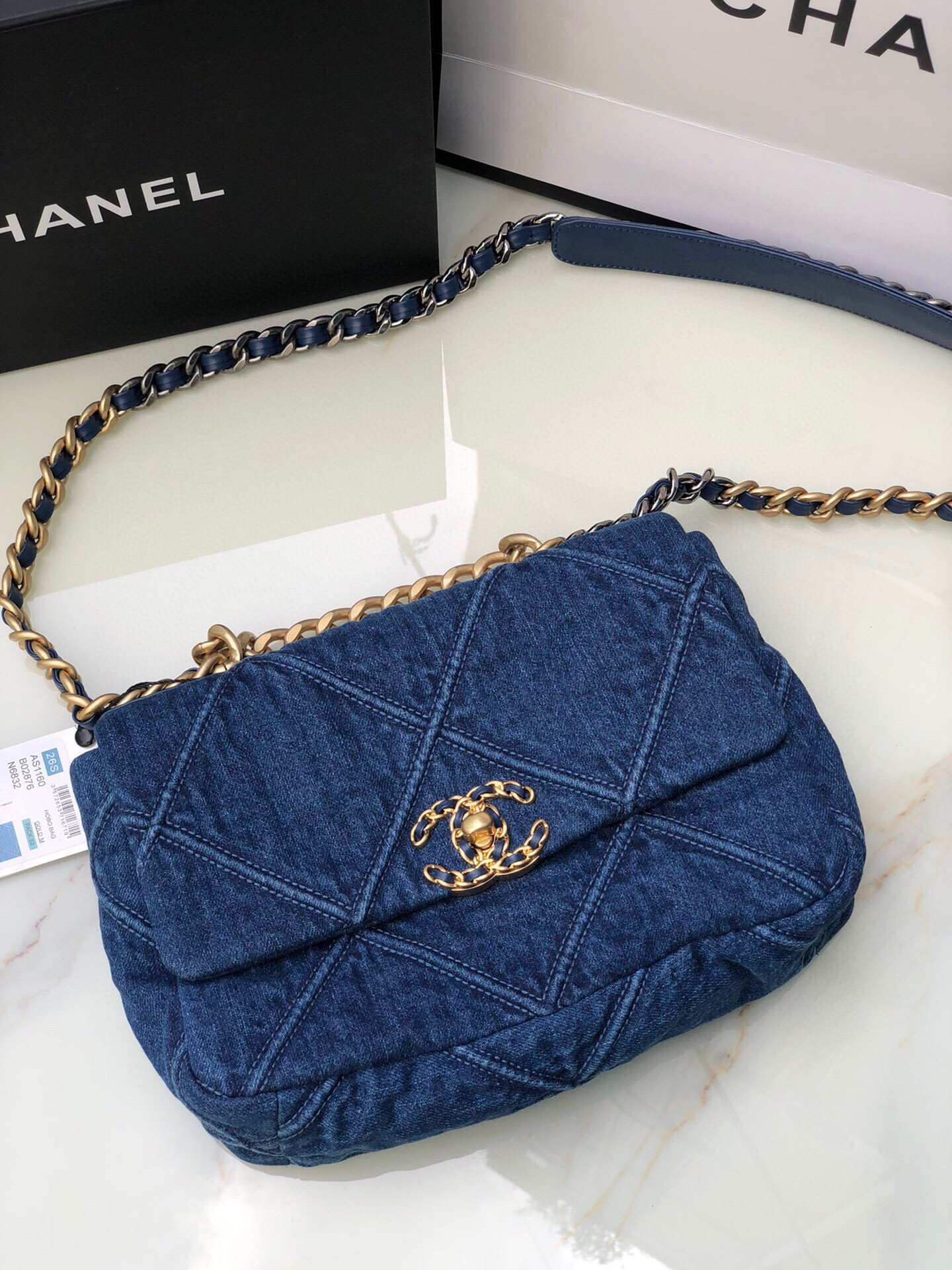 Ch*el 19 handbag ruthenium-finish metal navy 6.2 × 10.1 × 3.5 in