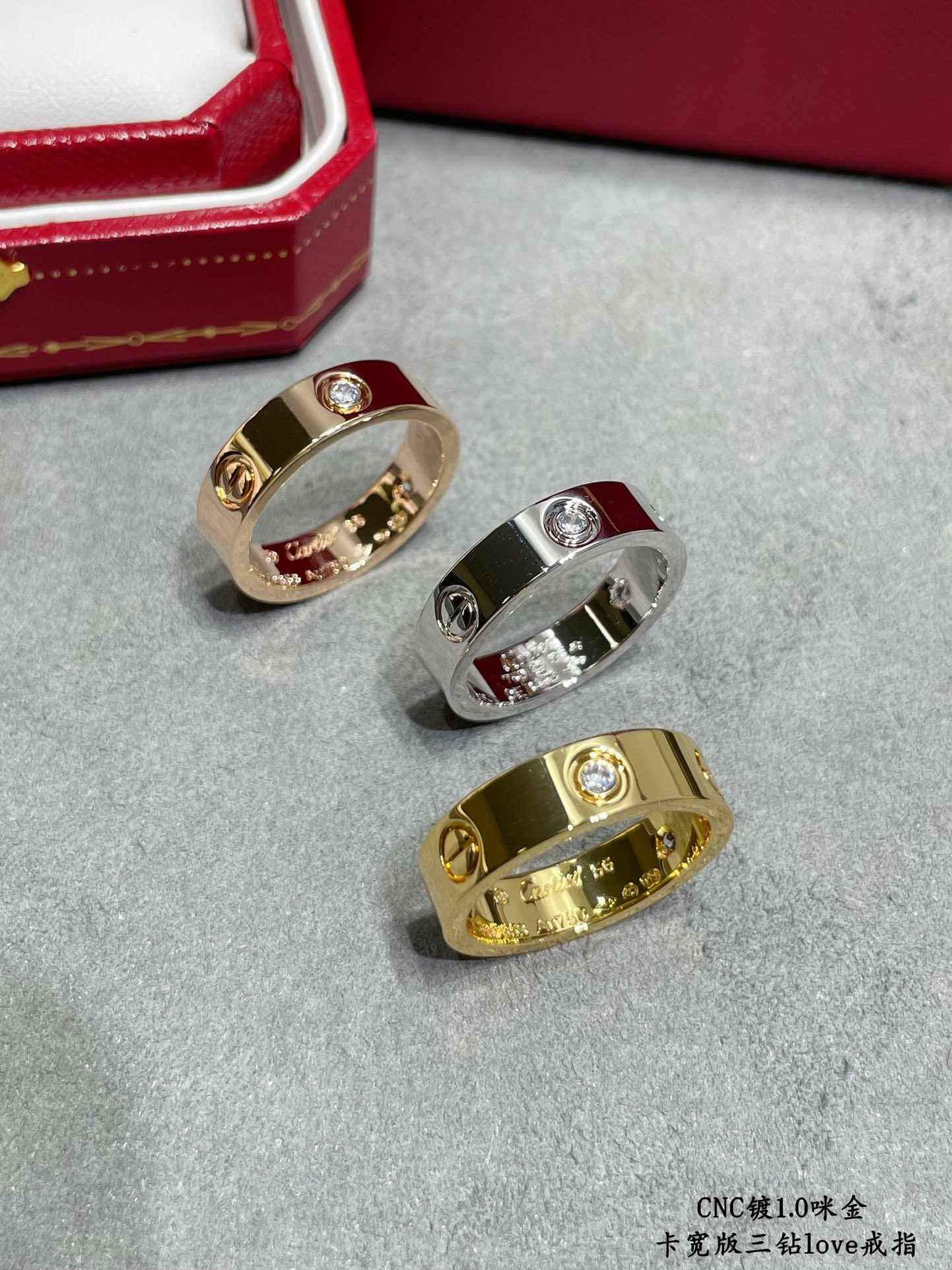 ca*t*er wide version three-Di*m*nd love ring