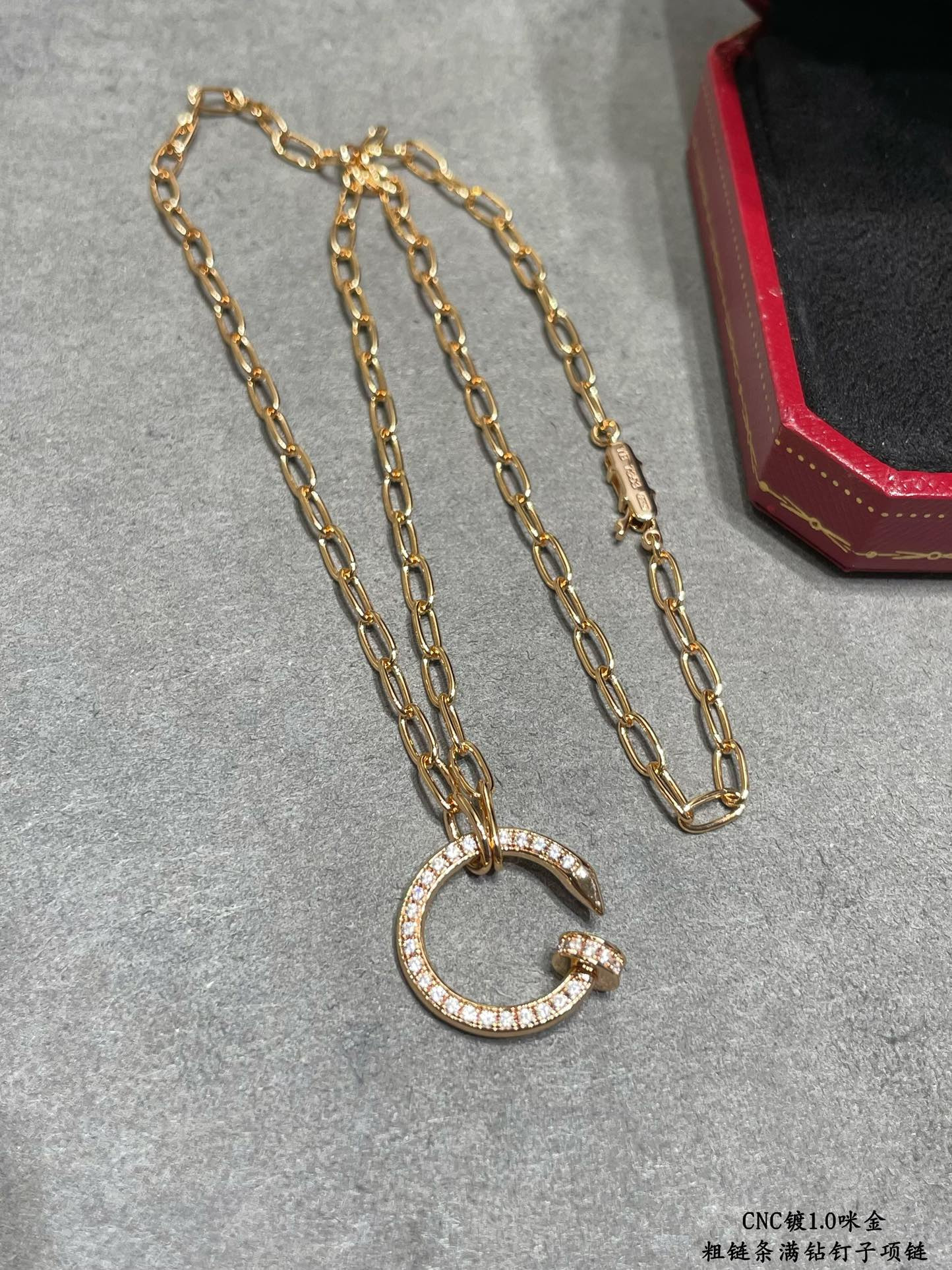 ca*t*er thick chain full of Di*m*nd nail necklace