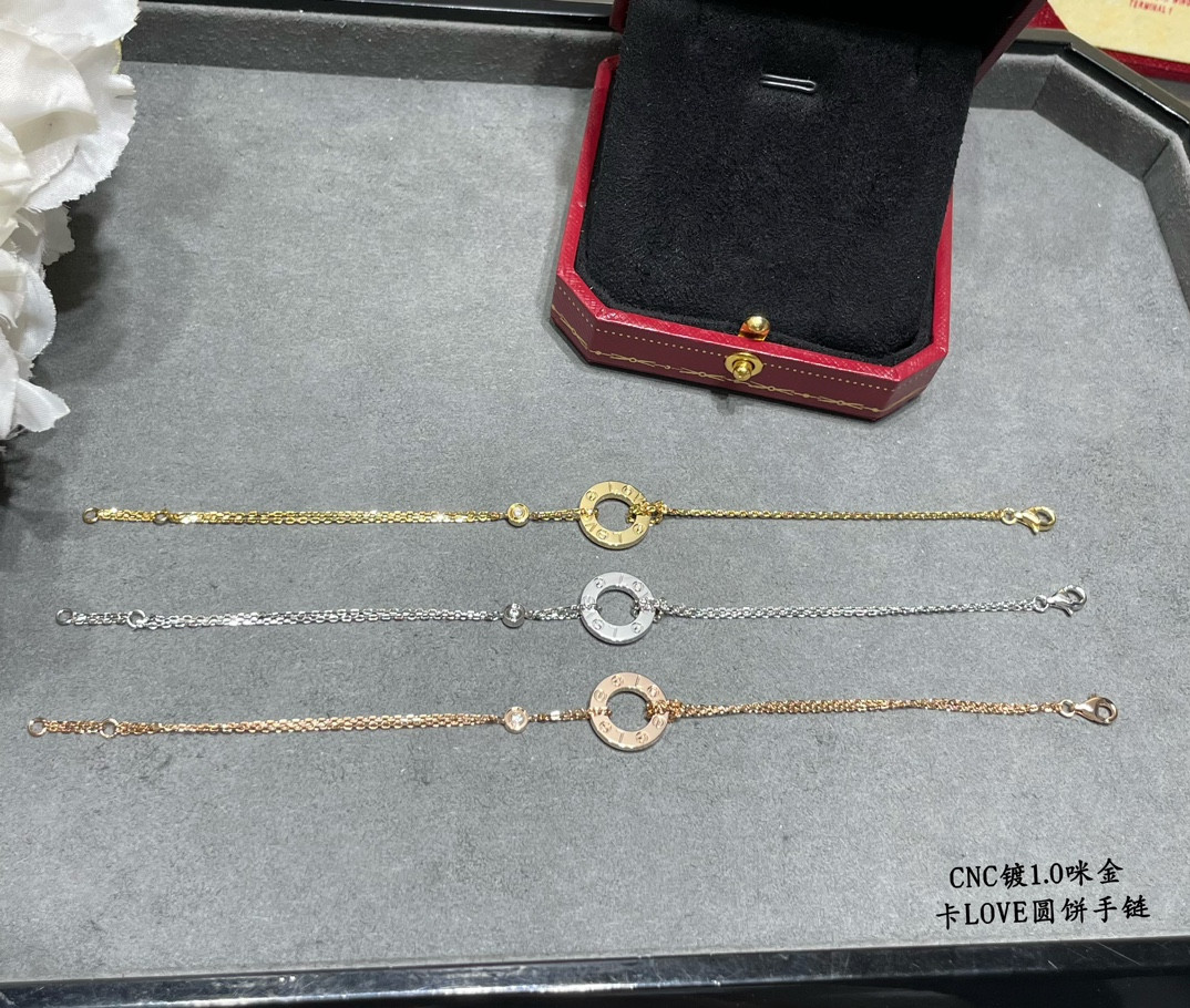 Ca*t*er double-sided coin bracelet