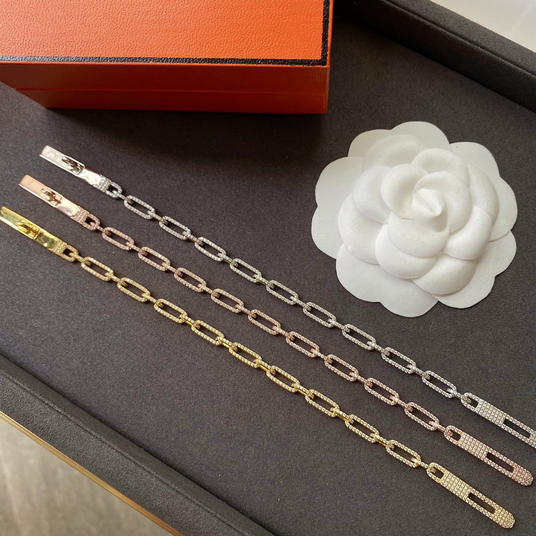hermès fully Di*m*nd-encrusted kelly bracelet
