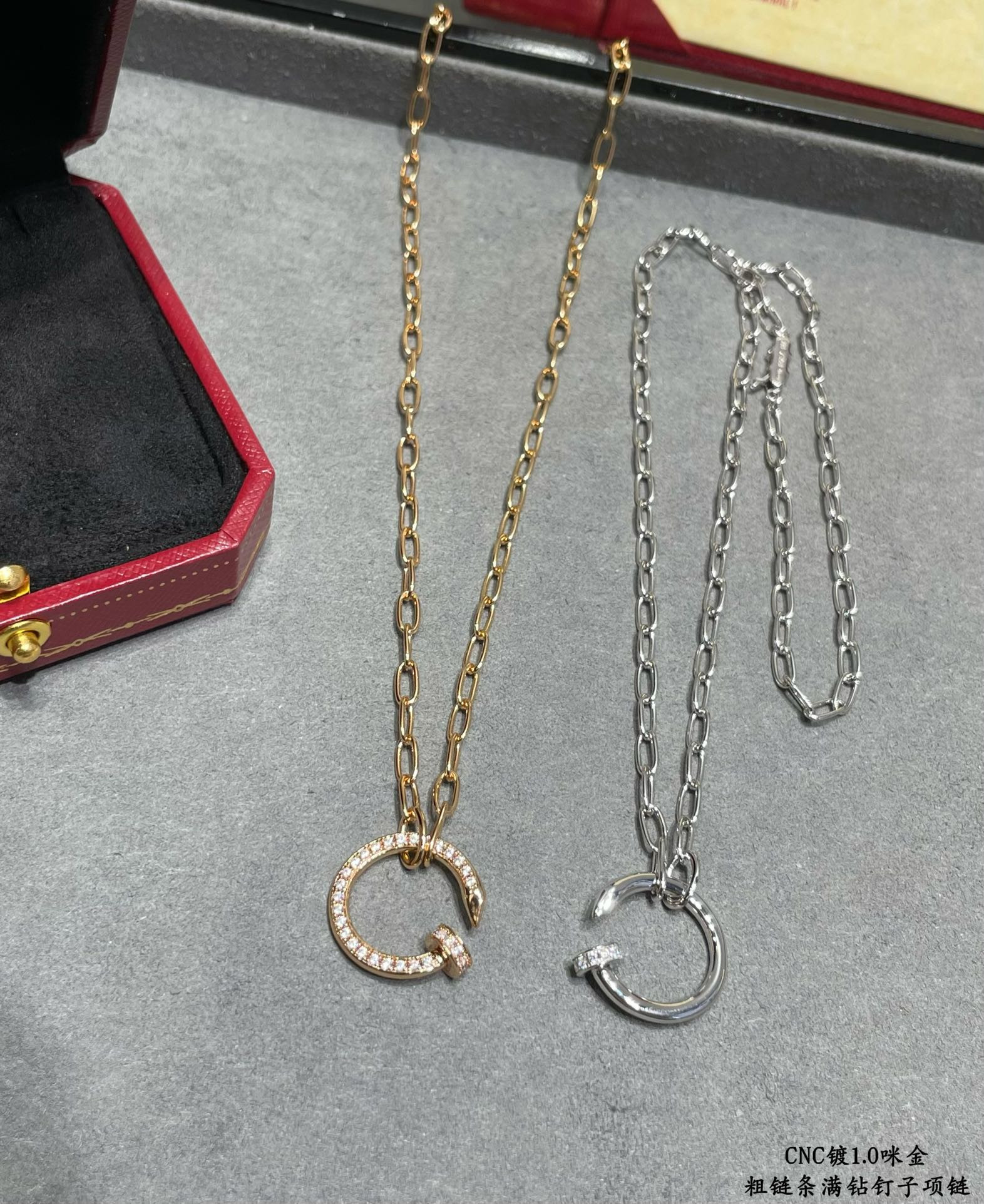 ca*t*er thick chain full of Di*m*nd nail necklace