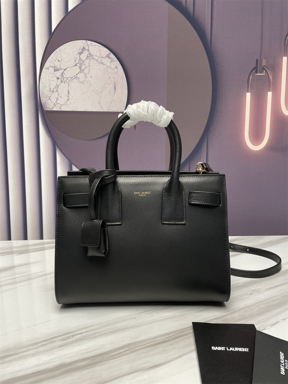 Y*L sac de jour baby in shiny leather black