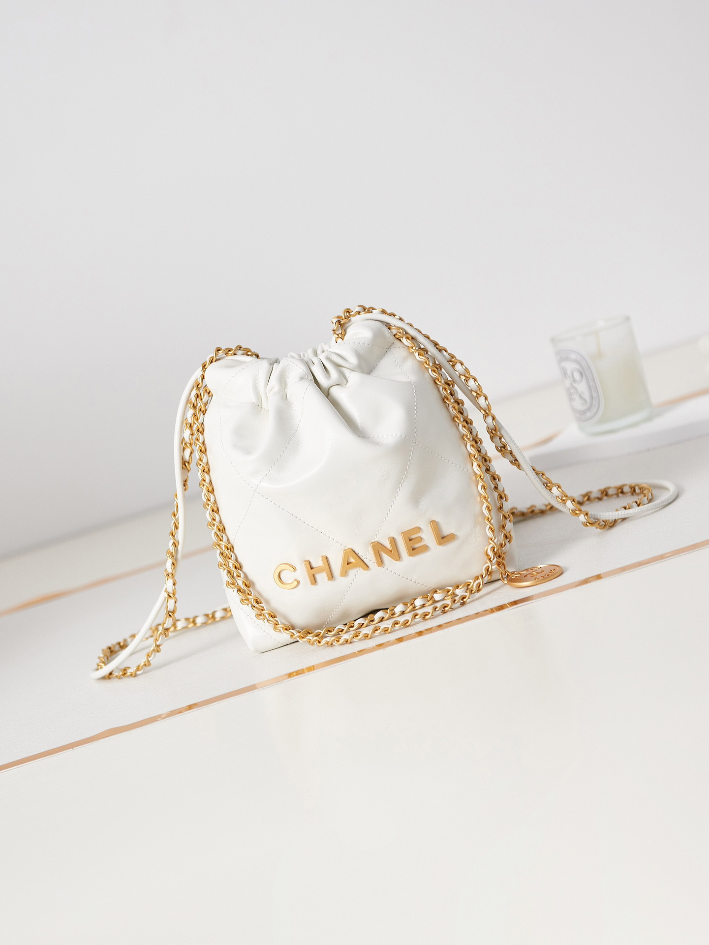 Ch*el 22 mini handbag shiny calfskin & gold-tone metal white 7.8 × 7.4 × 2.3 in