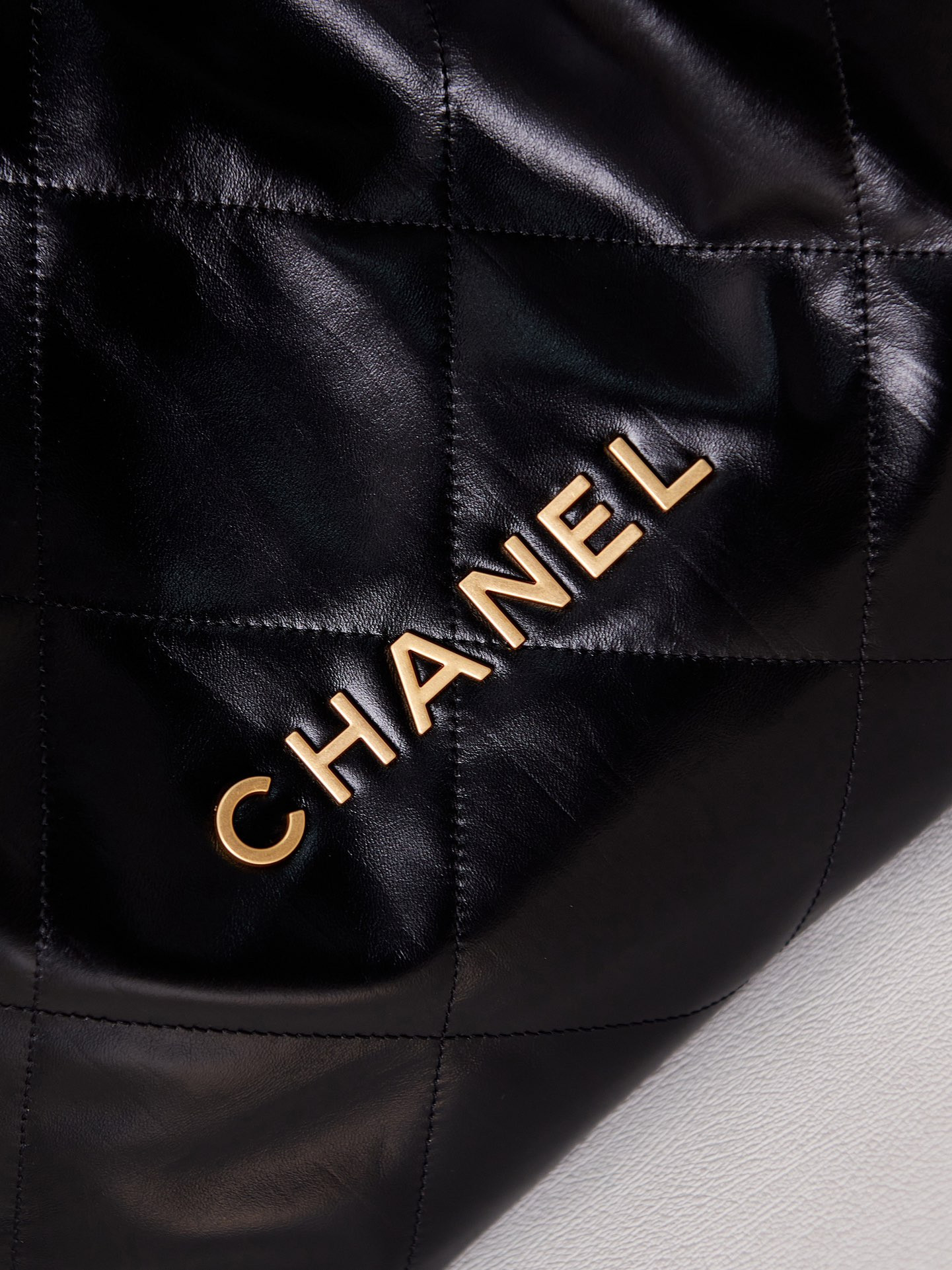 Ch*el 22 handbag shiny calfskin & gold-tone metal black 15.2×16.4×3.1 in