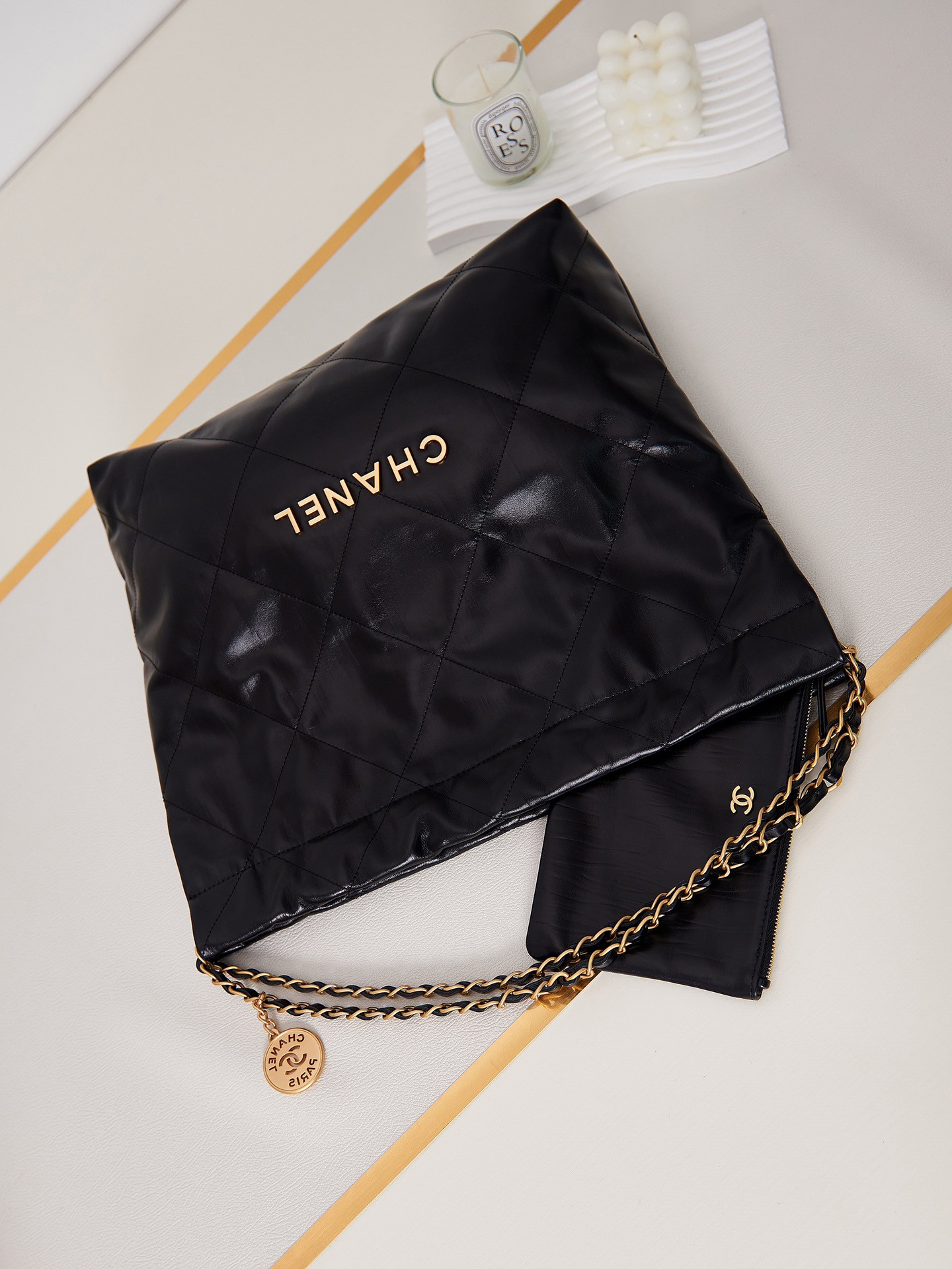Ch*el 22 handbag shiny calfskin & gold-tone metal black 15.2×16.4×3.1 in