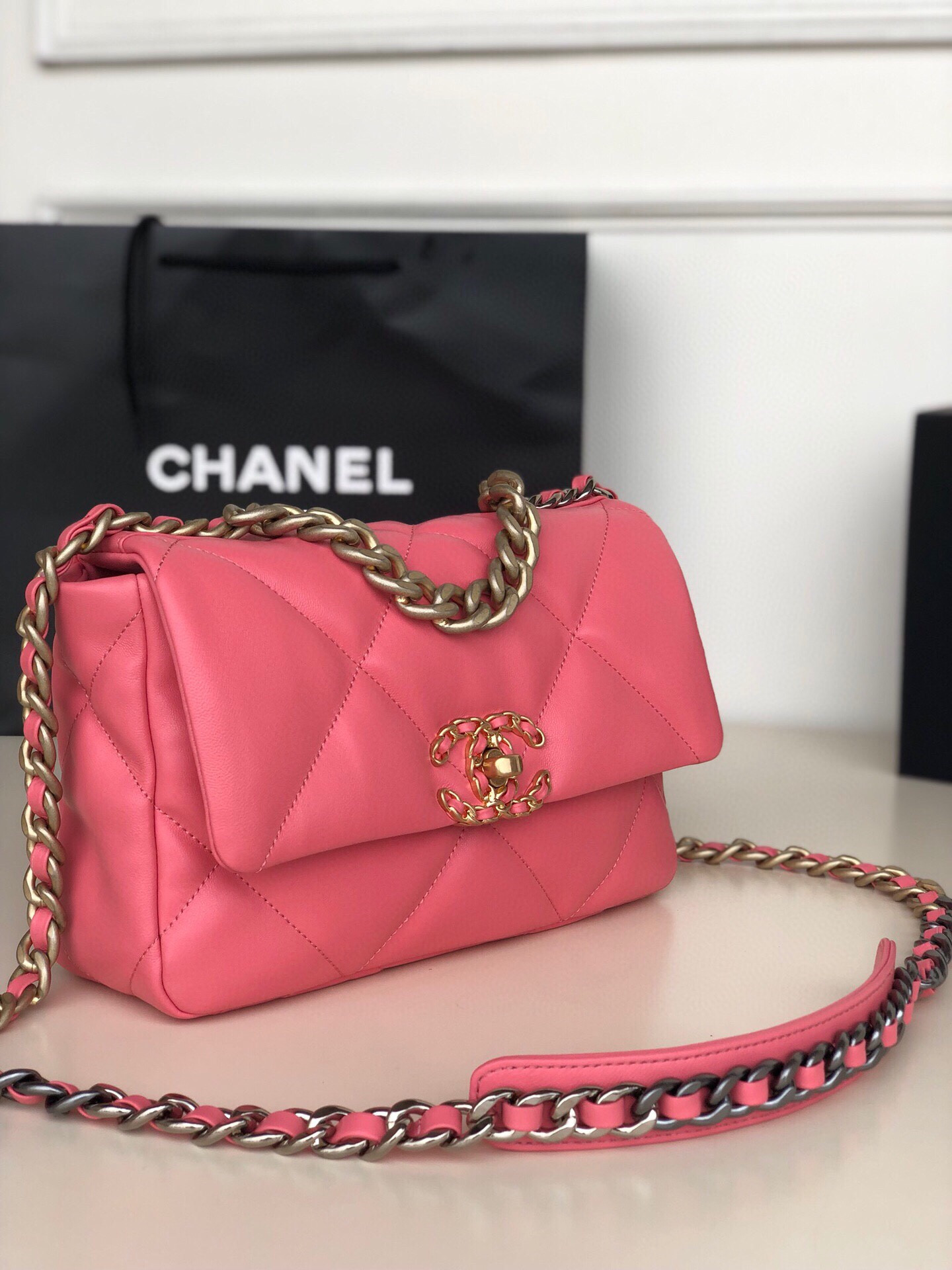 Ch*el 19 handbag shiny leather, gold-tone, silver-tone & ruthenium-finish metal pink 6.2 × 10.1 × 3.5 in