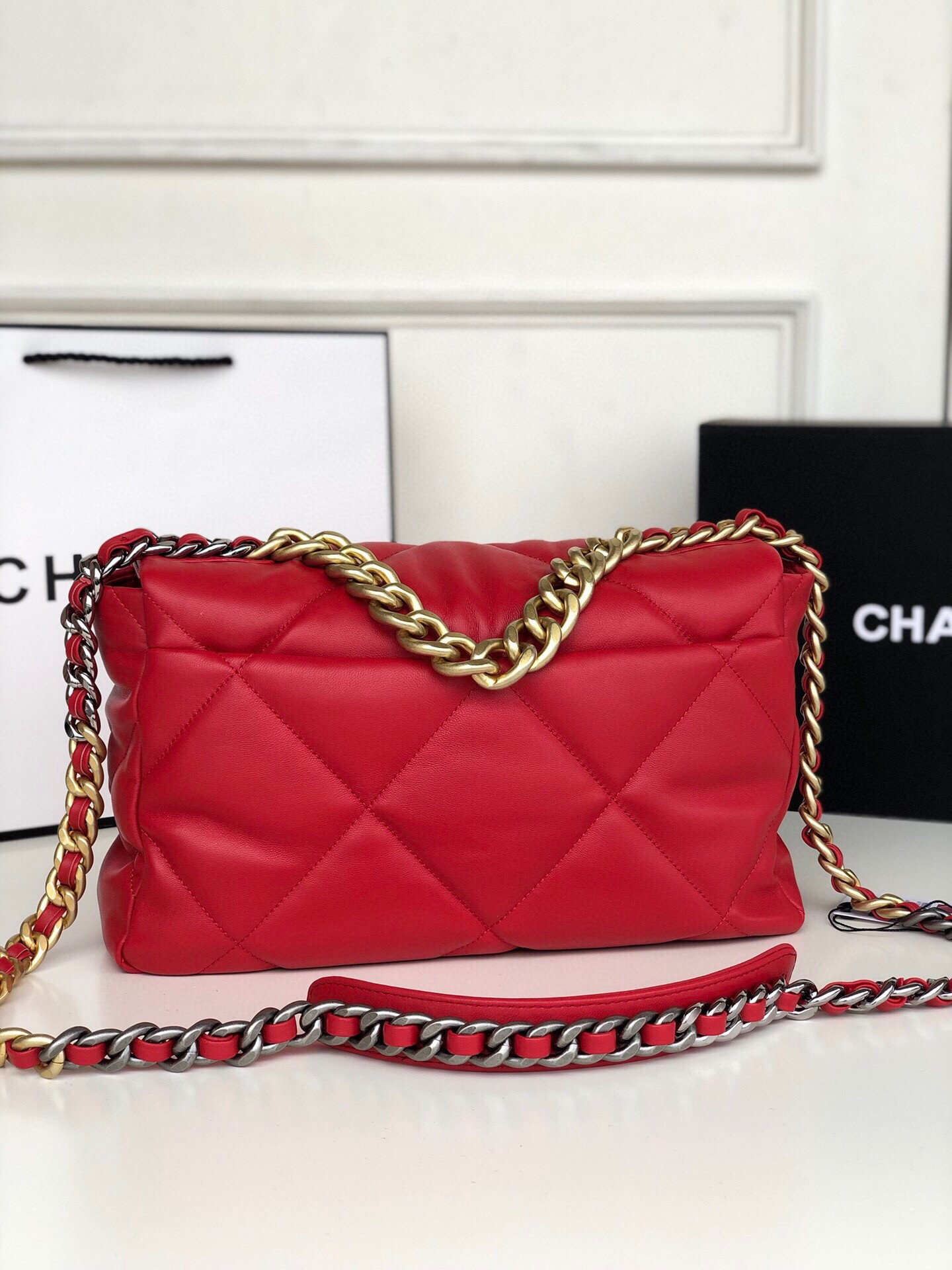 Ch*el 19 large handbag shiny leather, gold-tone, silver-tone & ruthenium-finish metal red 7.8 × 11.7 × 3.9 in