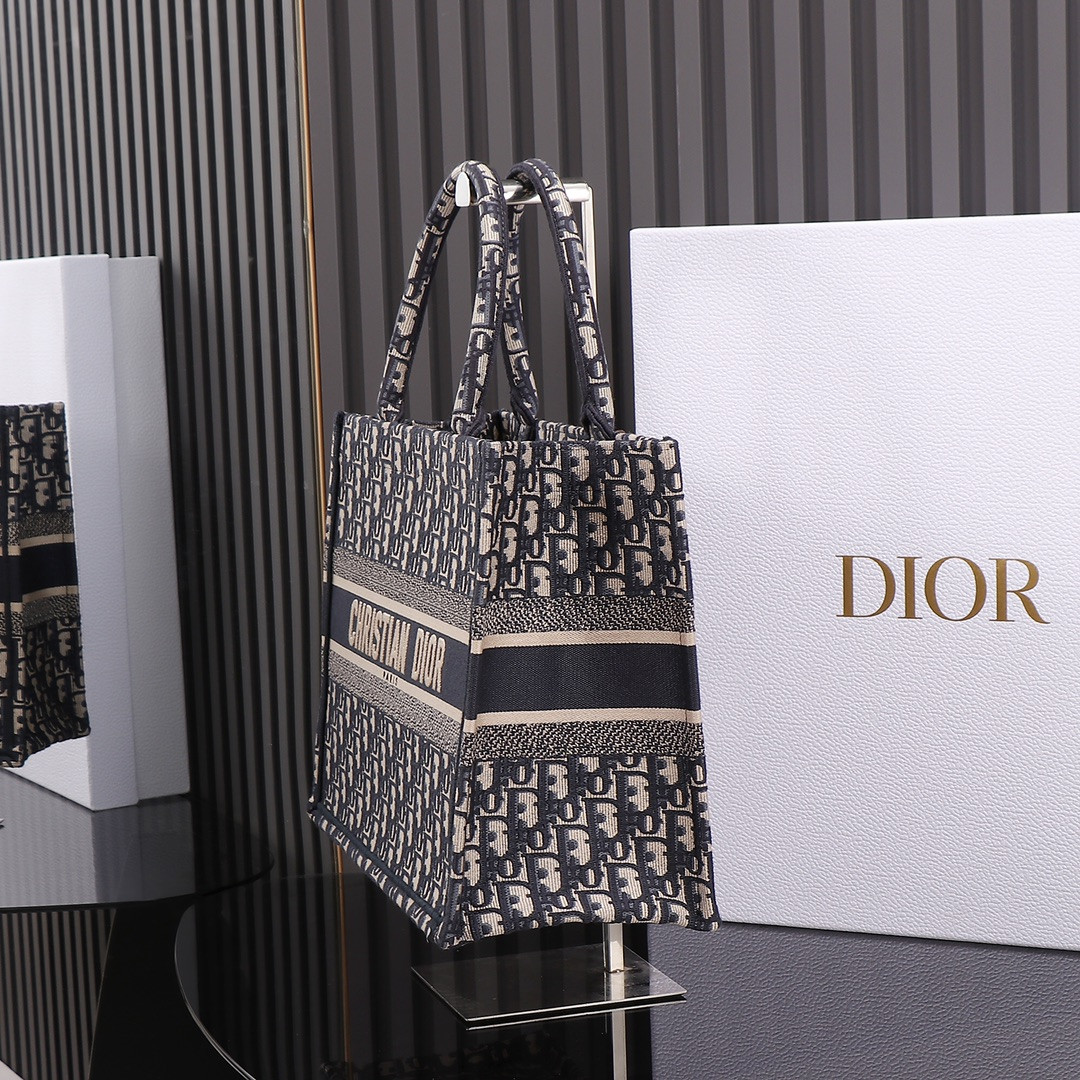 medium D*or book tote  ecru and blue D*or oblique embroidery 14 x 11 x 6.5 inches