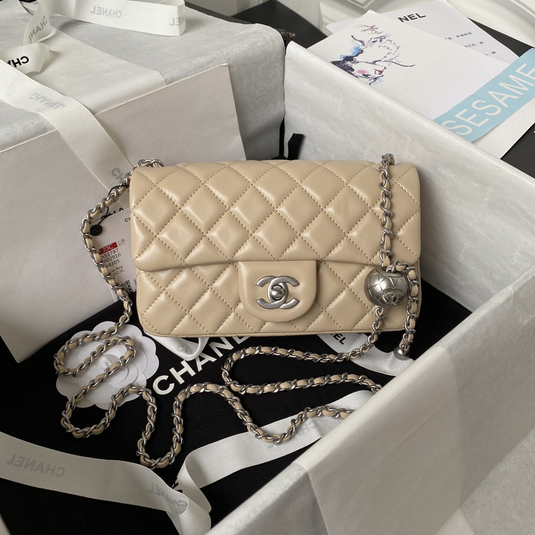 Ch*el mini flap bag shiny calfskin & silver-tone metal light beige 4.7 × 7.8 × 2.3 in