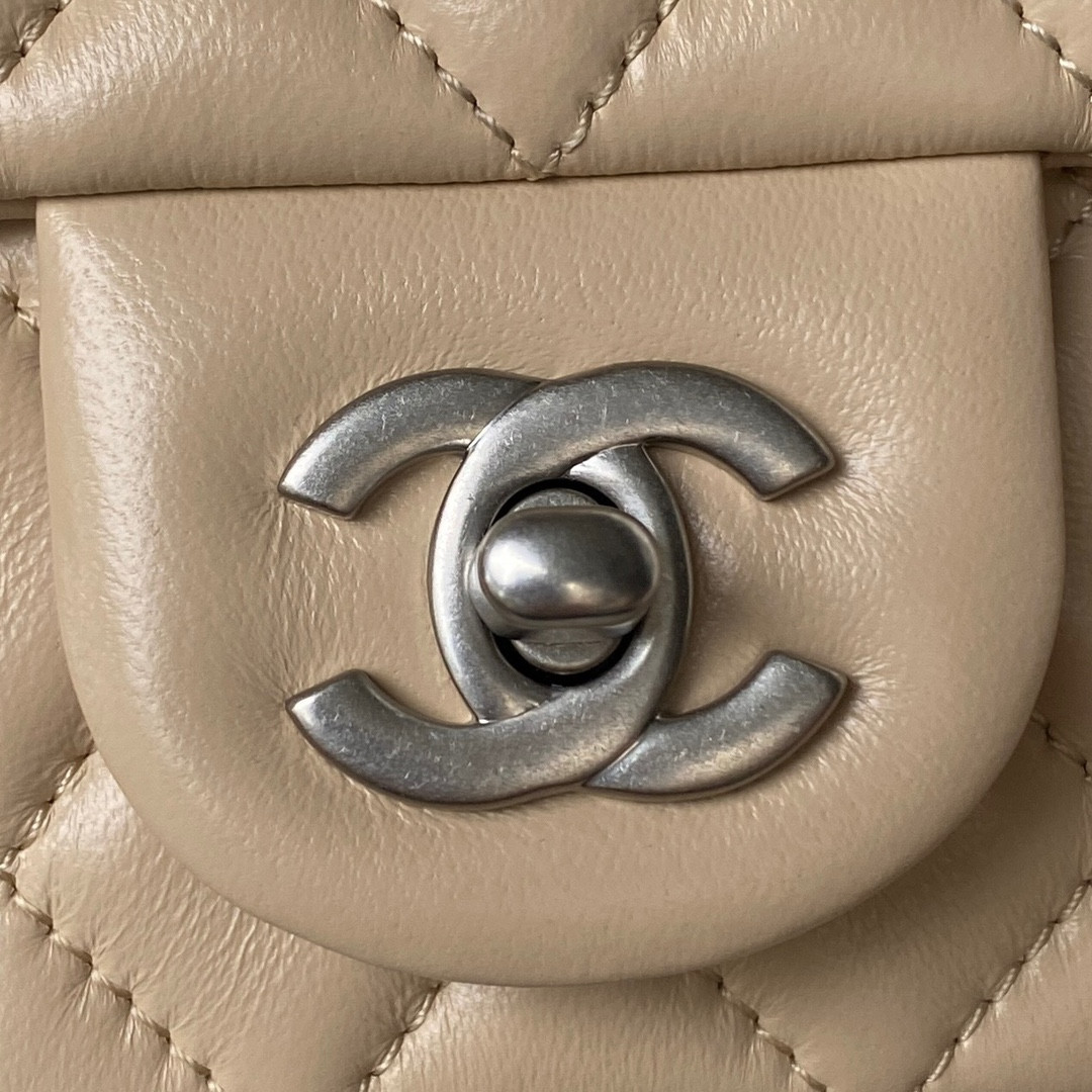 Ch*el mini flap bag shiny calfskin & silver-tone metal light beige 4.7 × 7.8 × 2.3 in