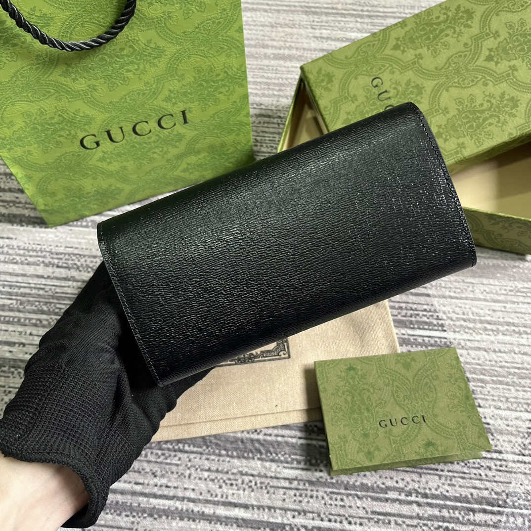 continental wallet with G*u*i script  7.5"w x 4"h x 1.4"d