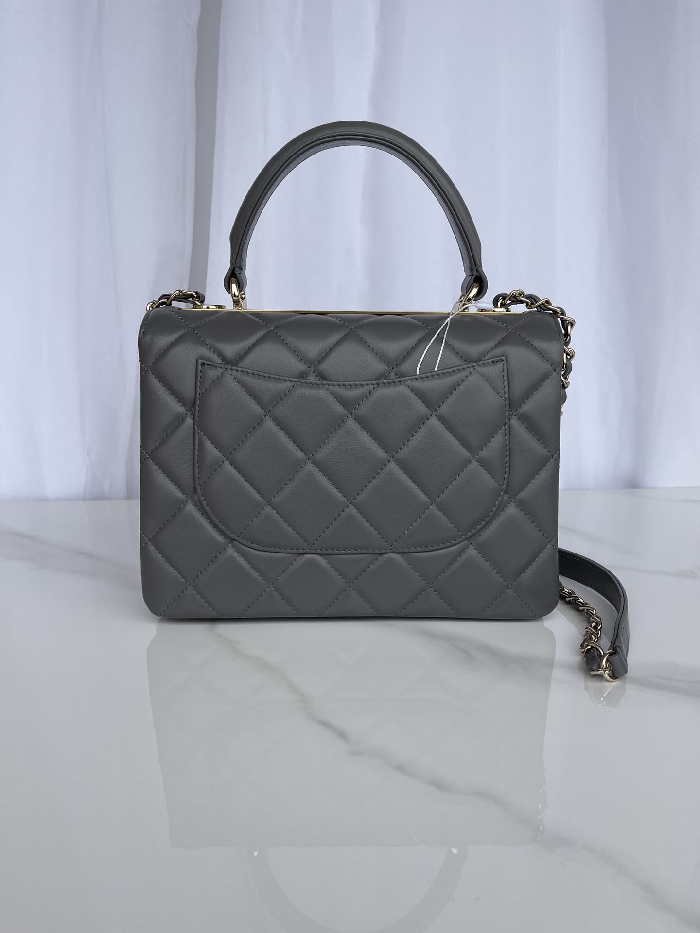 Ch*el flap bag with top handle 6.6 × 9.8 × 4.7 in