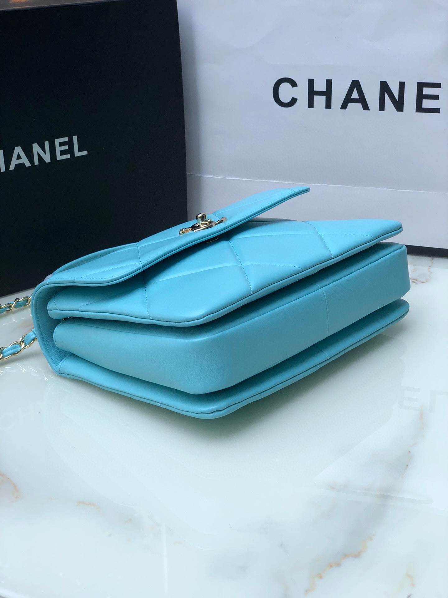 Ch*el flap bag with top handle 6.6 × 9.8 × 4.7 in