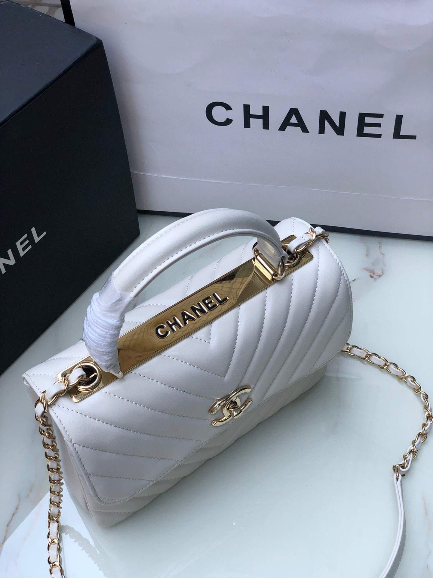 Ch*el flap bag with top handle white 6.6 × 9.8 × 4.7 in