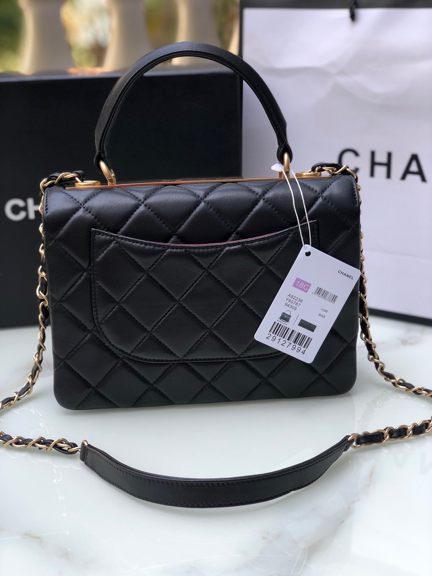 Ch*el flap bag with top handle 6.6 × 9.8 × 4.7 in