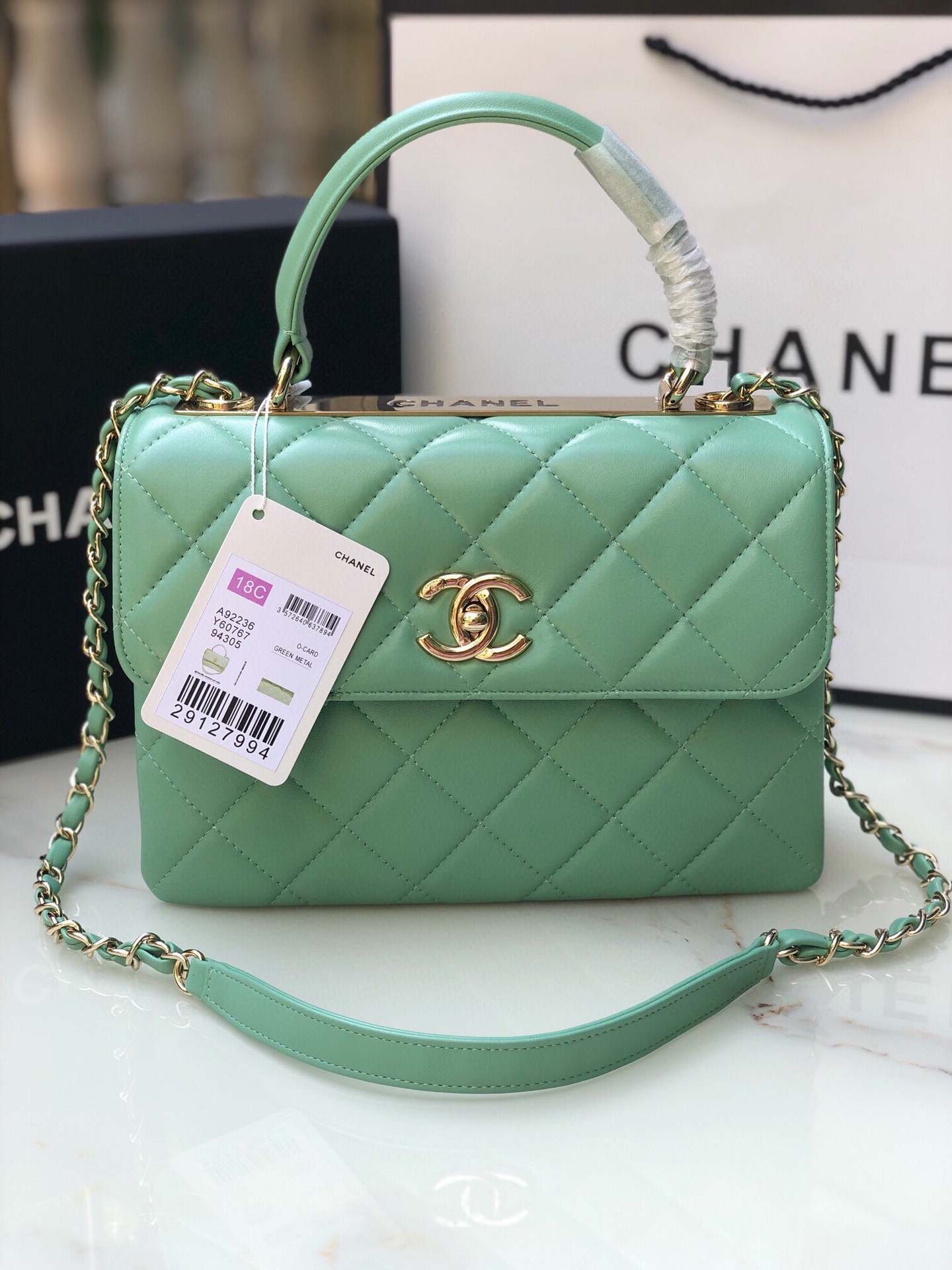 Ch*el flap bag with top handle 6.6 × 9.8 × 4.7 in