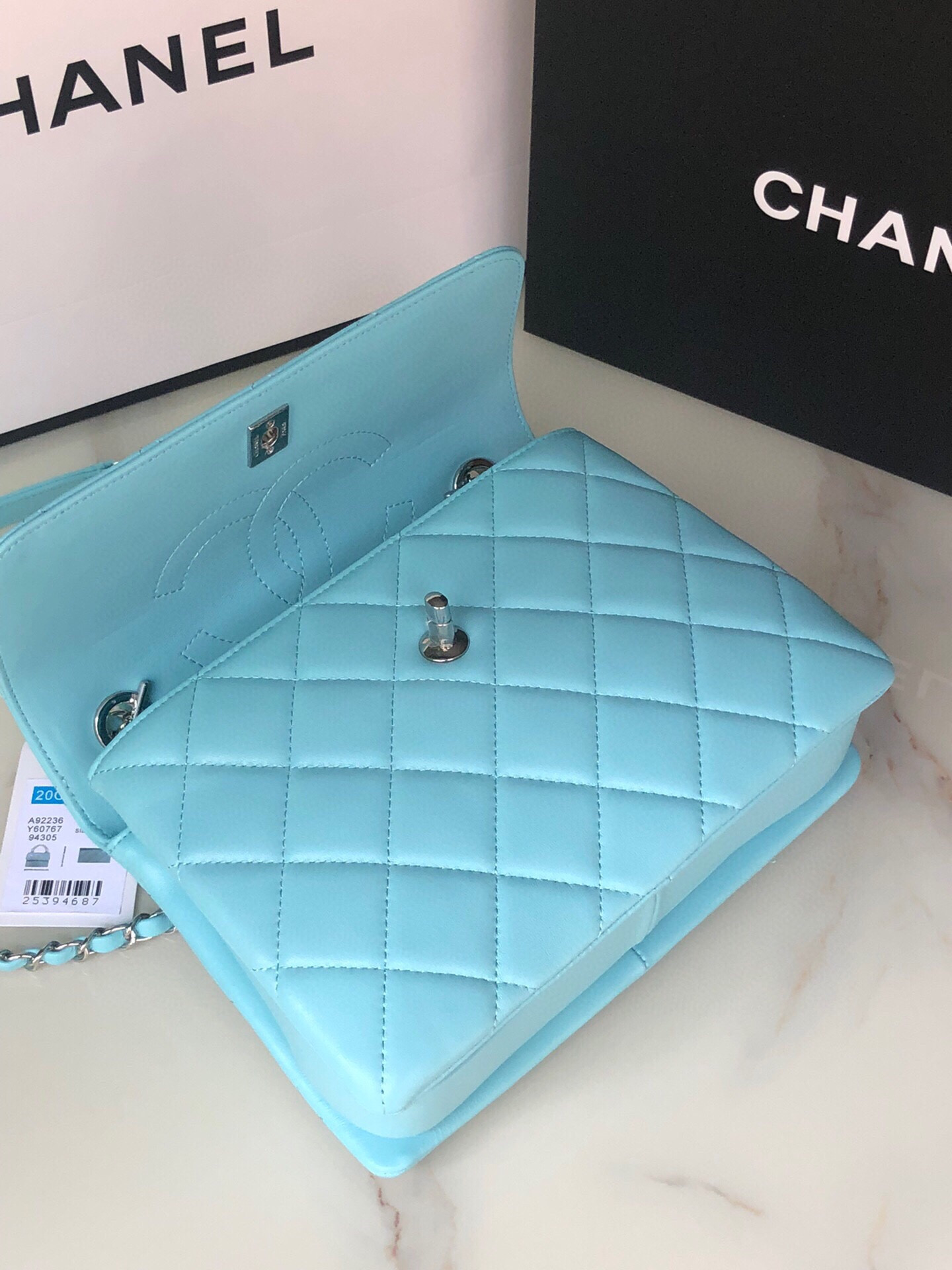 Ch*el flap bag with top handle 6.6 × 9.8 × 4.7 in