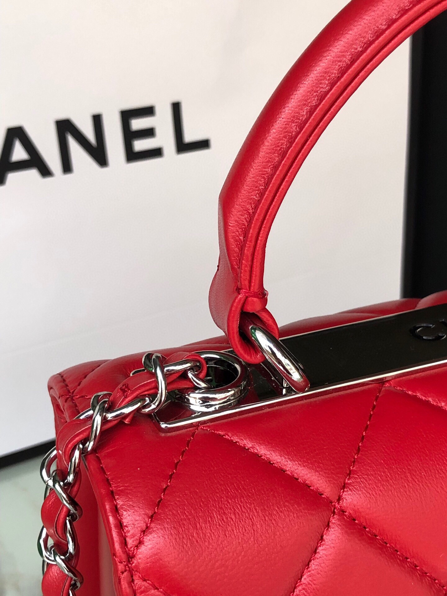 Ch*el flap bag with top handle 6.6 × 9.8 × 4.7 in