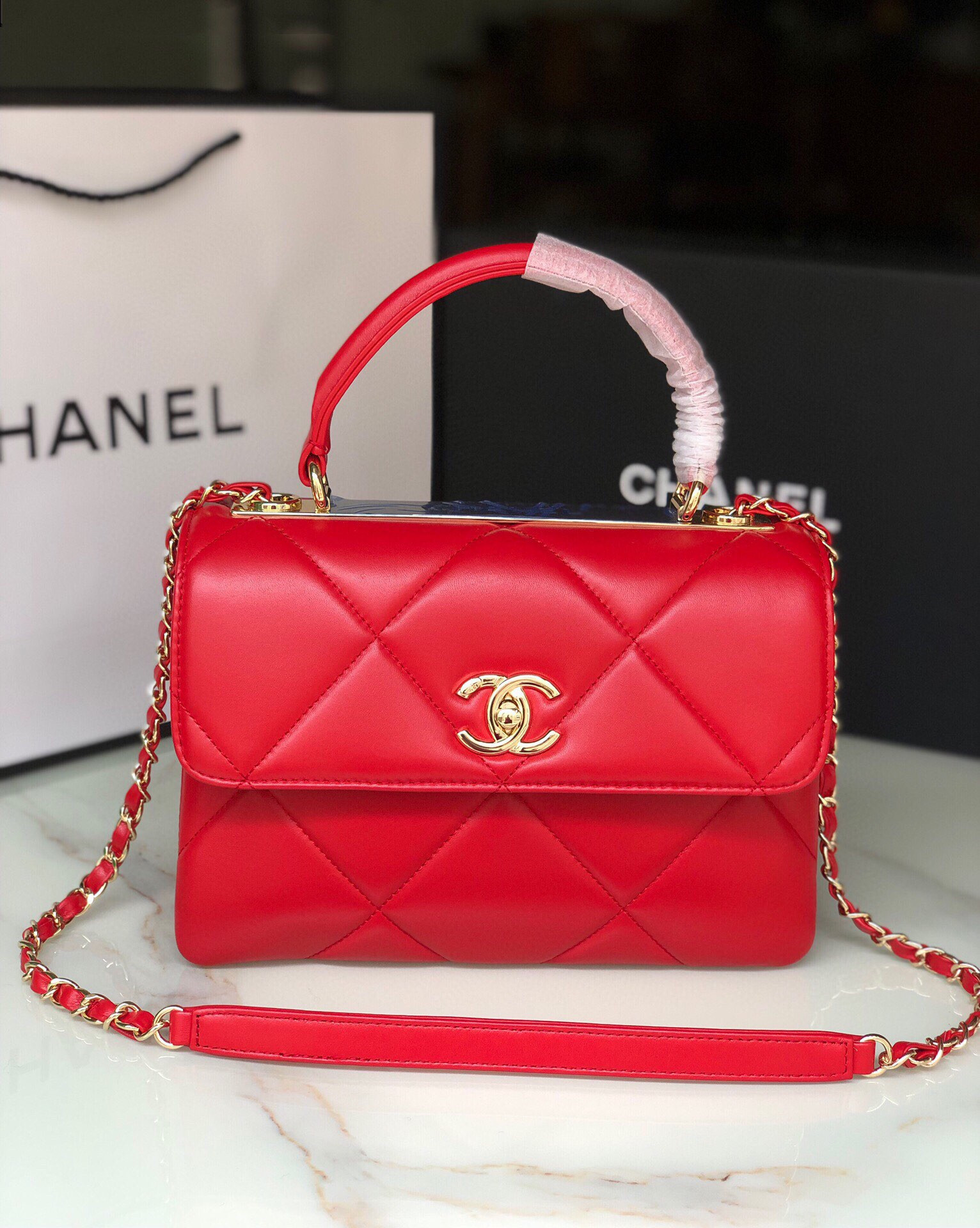 Ch*el flap bag with top handle 6.6 × 9.8 × 4.7 in