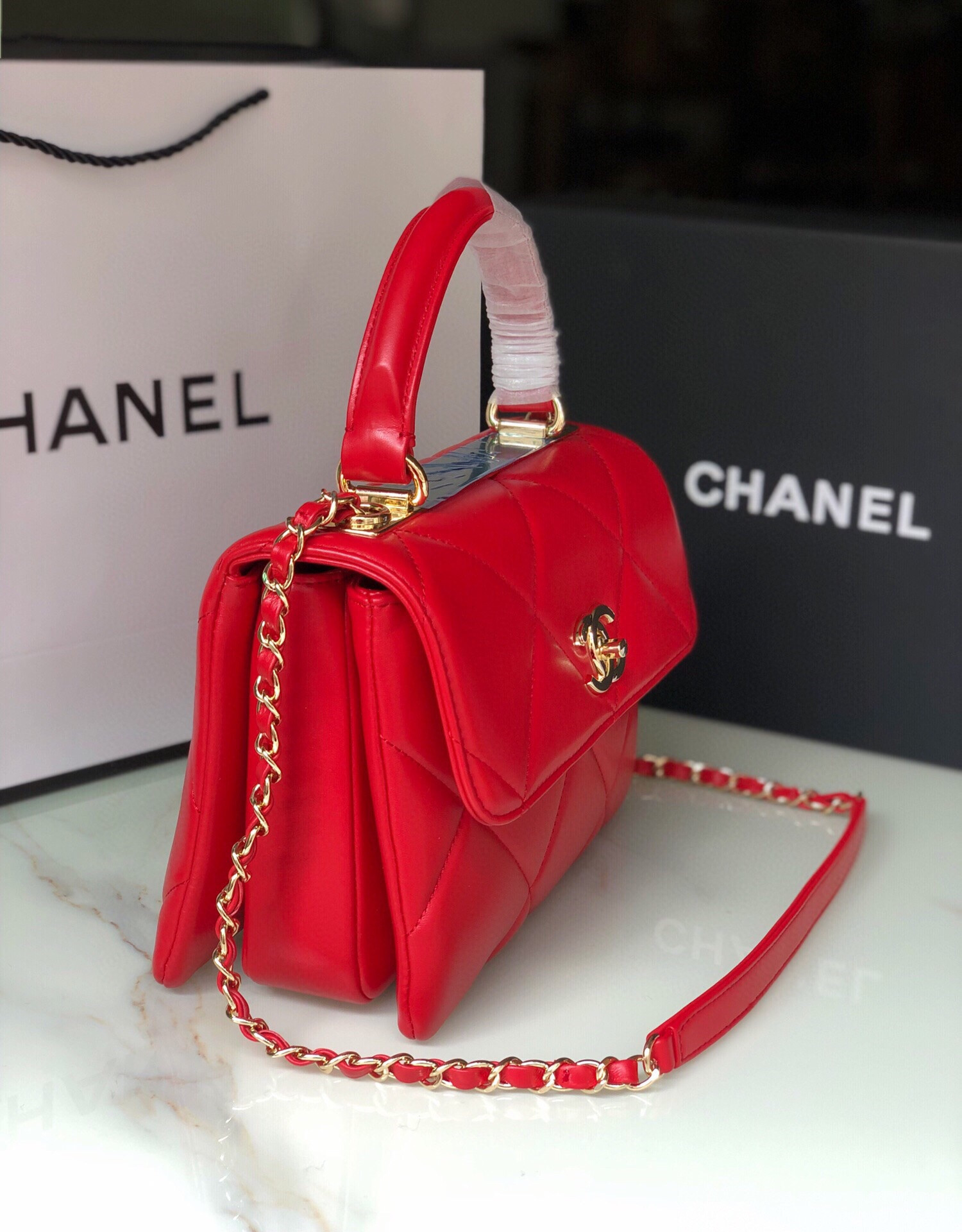 Ch*el flap bag with top handle 6.6 × 9.8 × 4.7 in