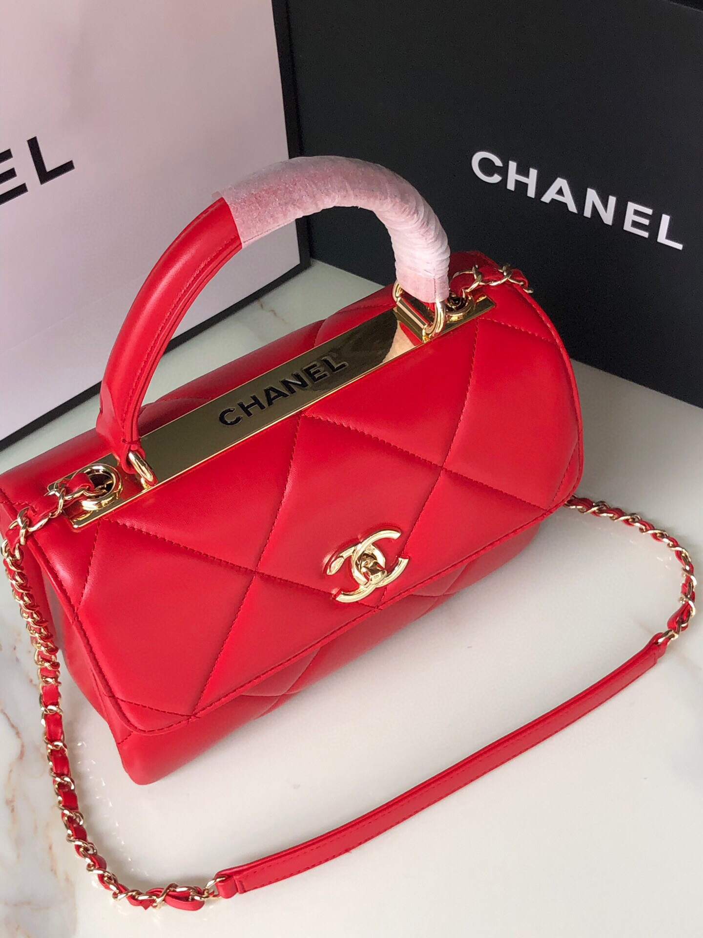 Ch*el flap bag with top handle 6.6 × 9.8 × 4.7 in