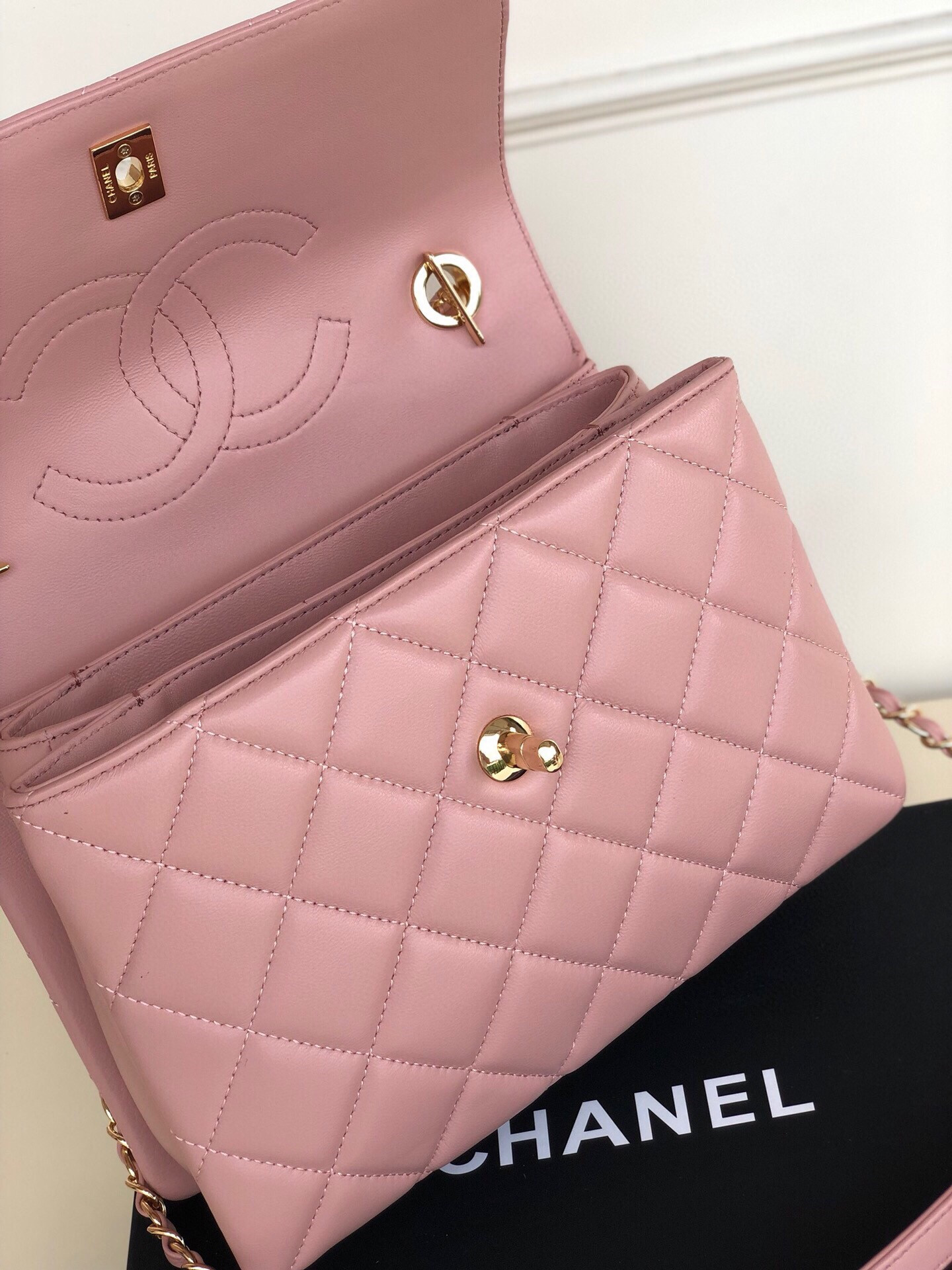 Ch*el flap bag with top handle 6.6 × 9.8 × 4.7 in