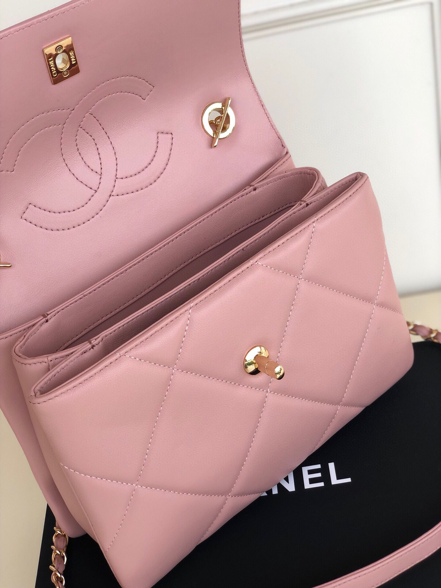 Ch*el flap bag with top handle 6.6 × 9.8 × 4.7 in