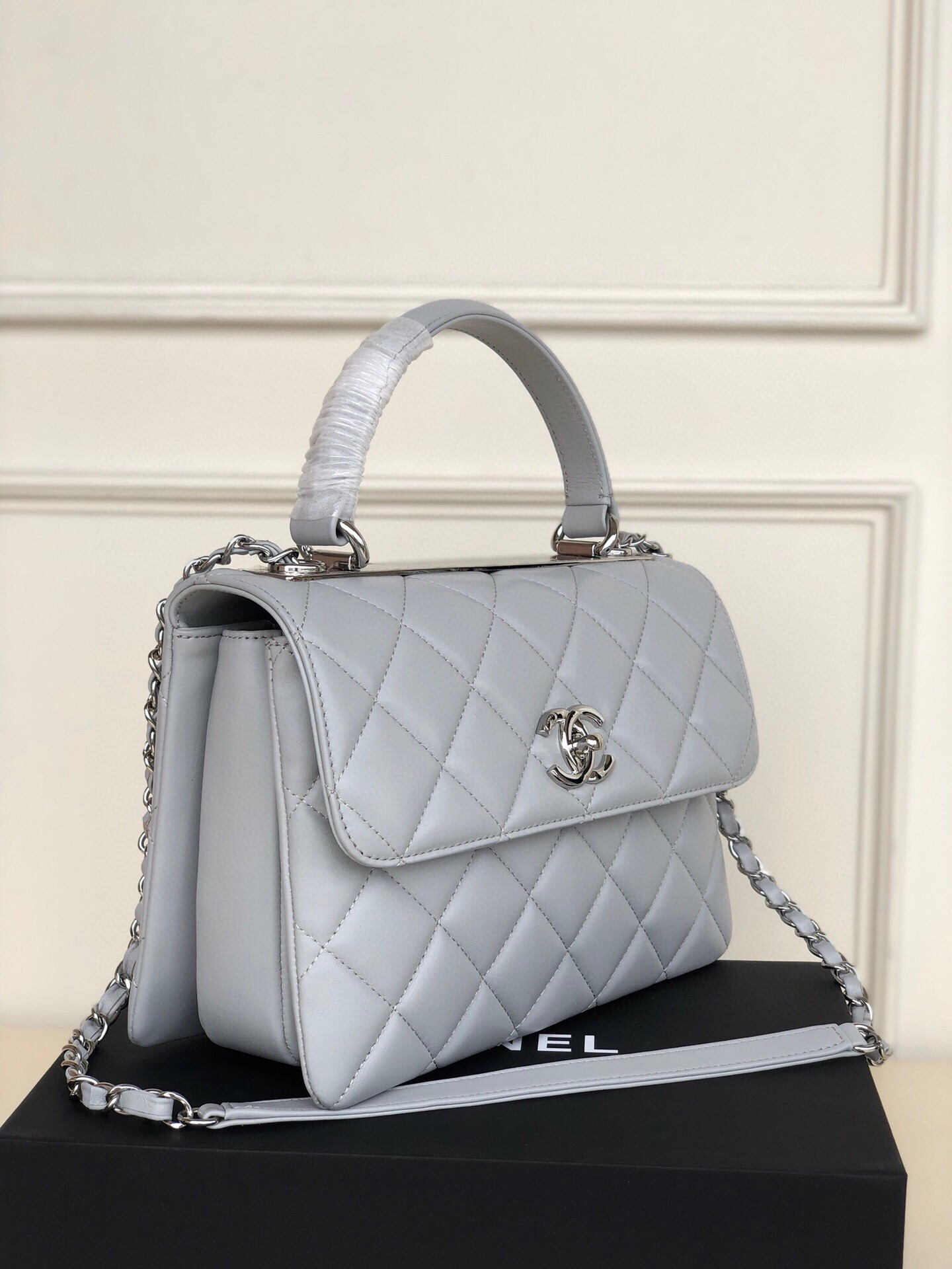 Ch*el flap bag with top handle 6.6 × 9.8 × 4.7 in