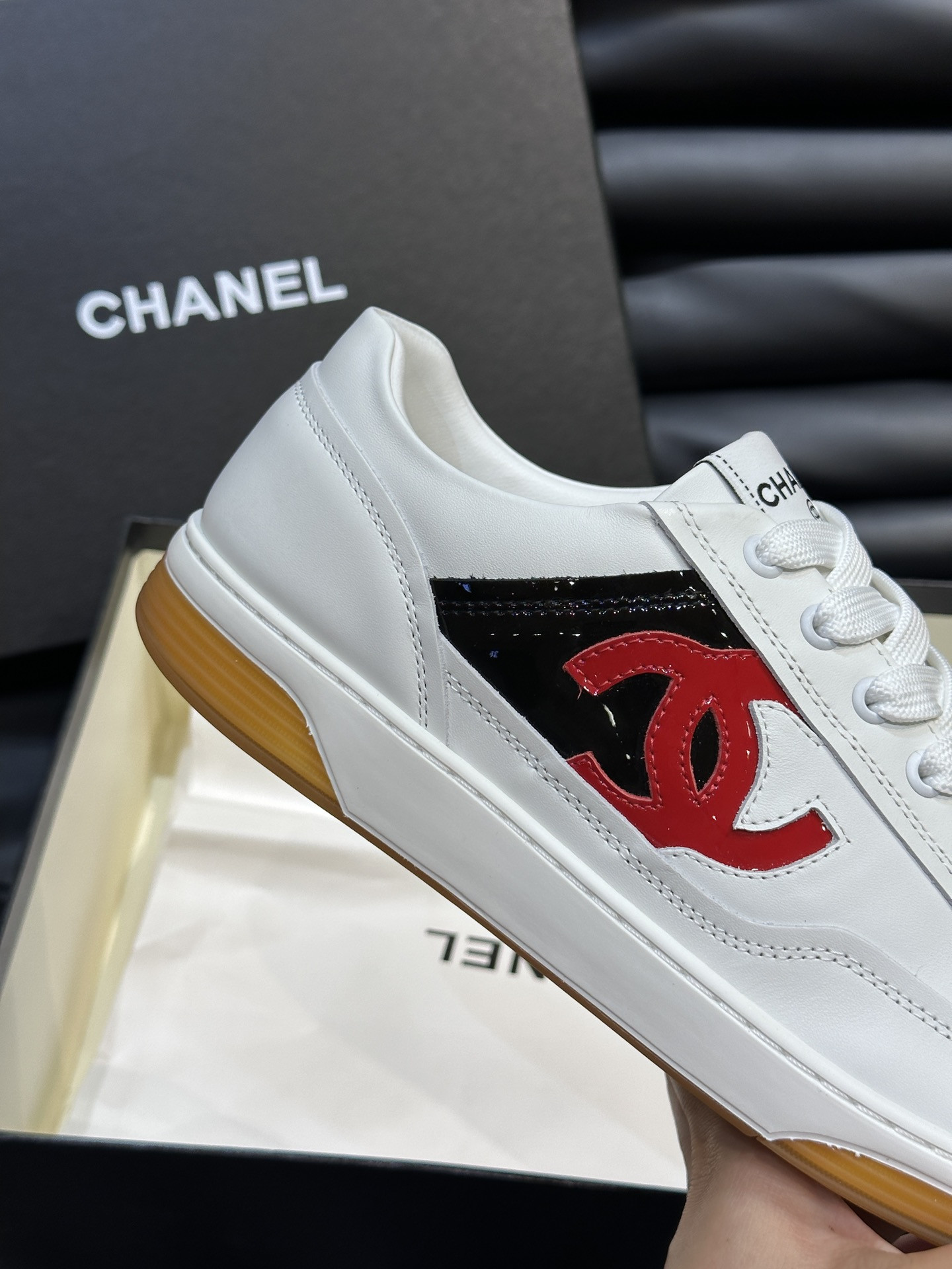 ua Ch*el sneaker calfskin