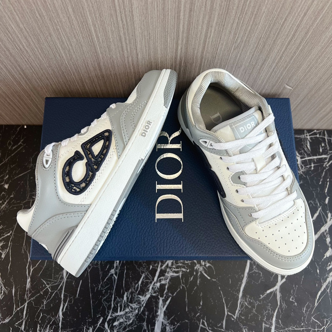 ua D*or b57 low-top sneaker  gray and white