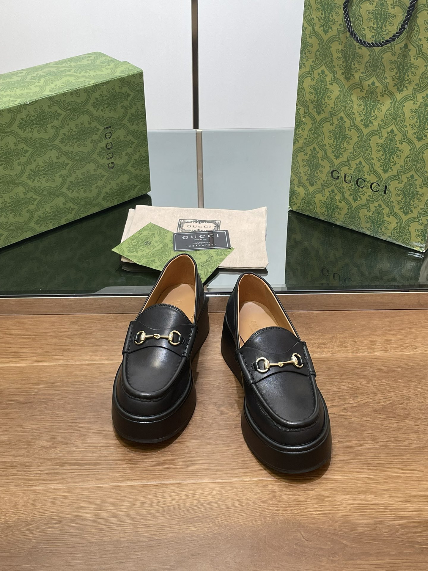 ua G*u*i horsebit wedge loafer