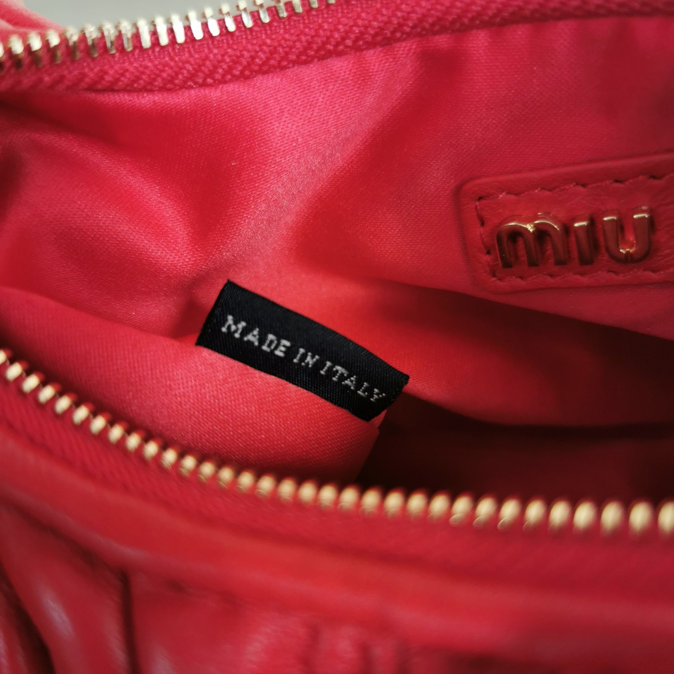 Miu Miu Wander matelassé nappa leather hobo mini-bag 14x17.5x5.5cm
