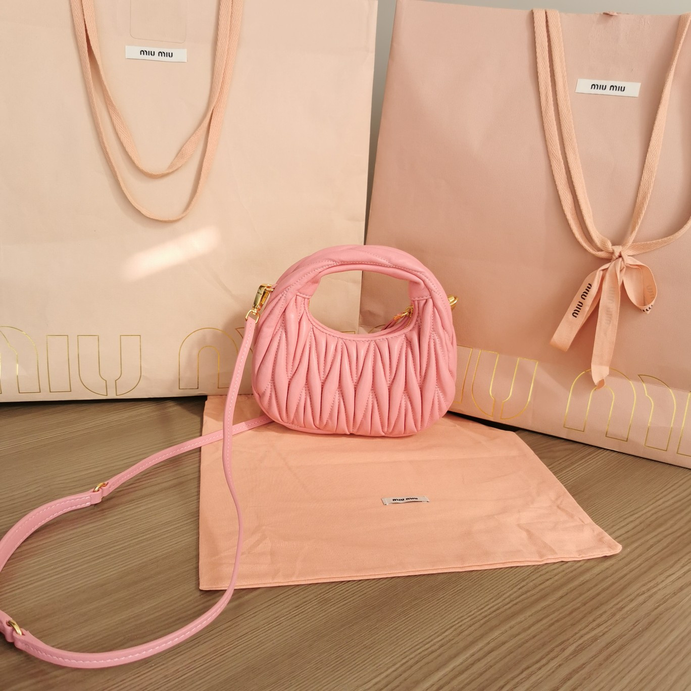 Miu Miu Wander matelassé nappa leather hobo mini-bag 14x17.5x5.5cm