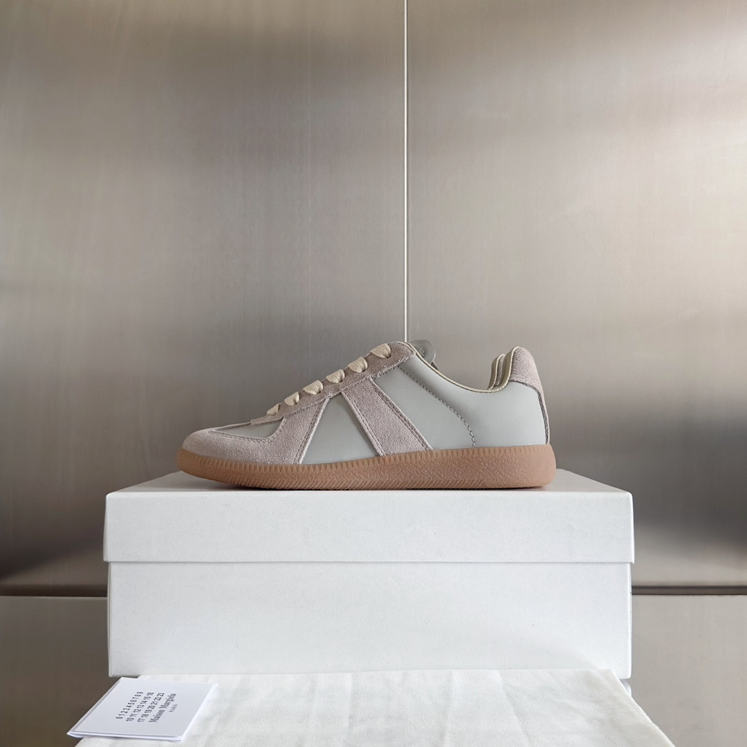 ua ma*s*n Ma*i*la mm6 sneakers
