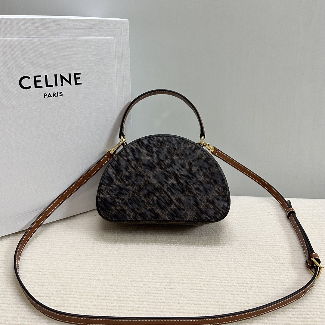 Ce**e half moon case in triomphe canvas and calfskin 17.5x12x6cm